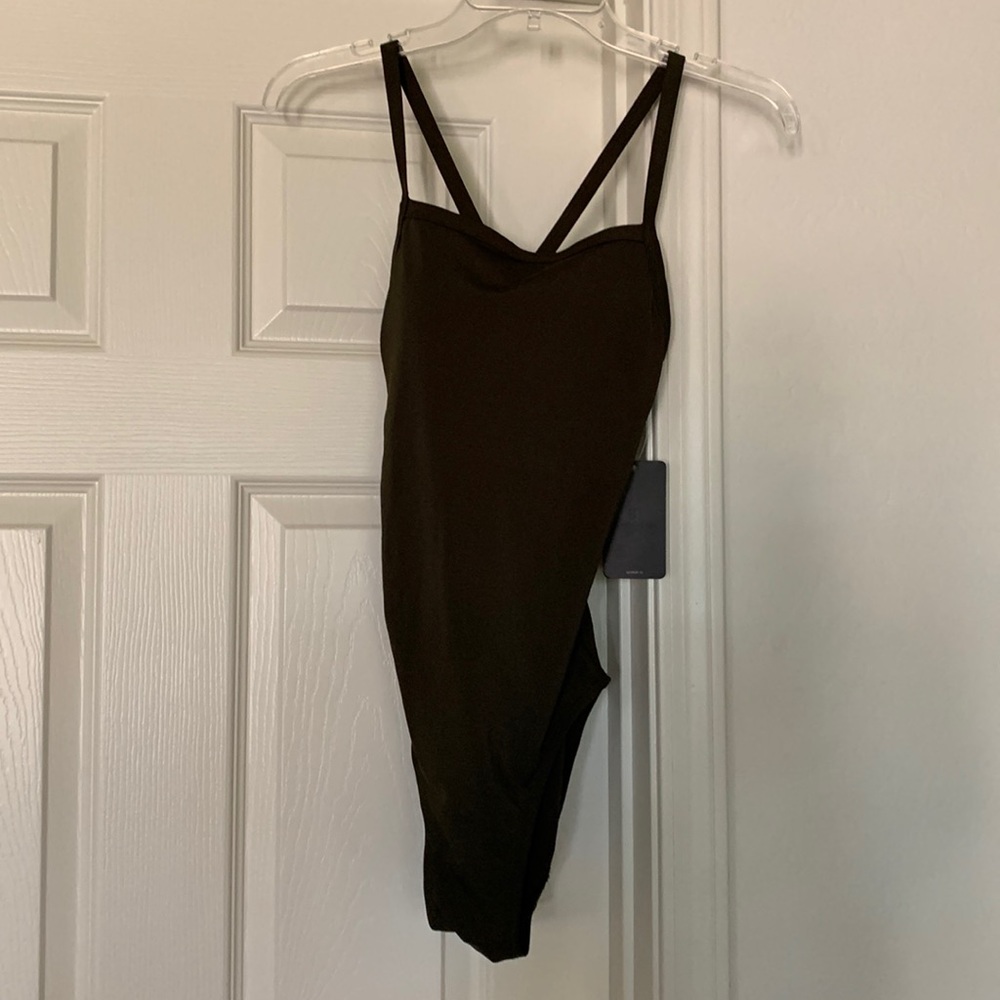 Syrokan dark olive one piece bathing suit size 32 or small. Open back flatterin